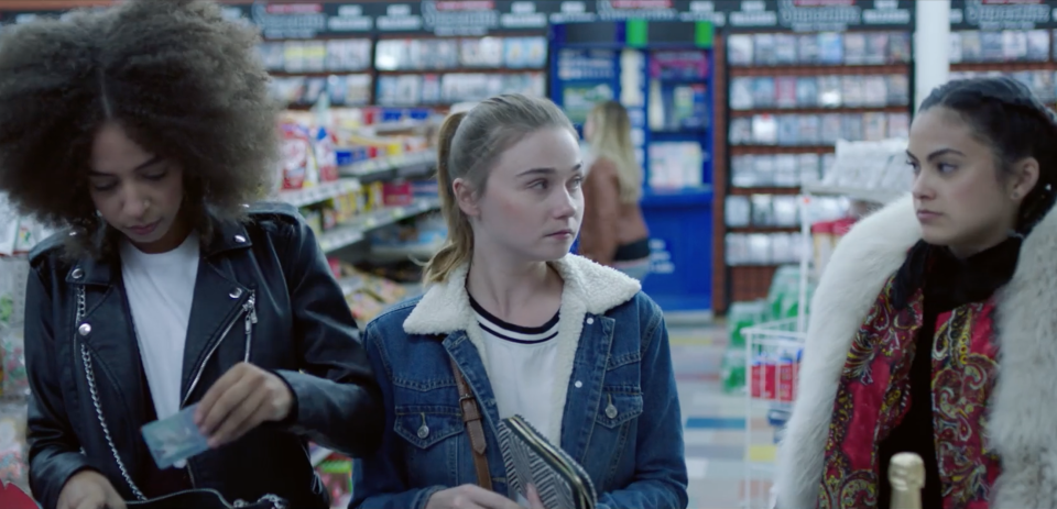 Blake and two other young women standing in a store