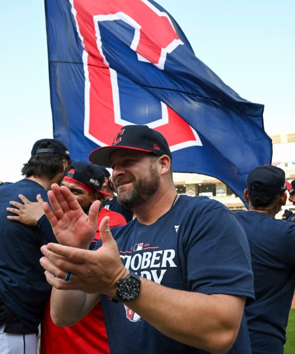 Cleveland Guardians manager Stephen Vogt celebrates the team’s 3-2, 10-inning win over the Minnesota Twins which earned the team a berth in baseball’s playoff, Thursday, Sept. 19, 2024, in Cleveland. (AP Photo/Nick Cammett)