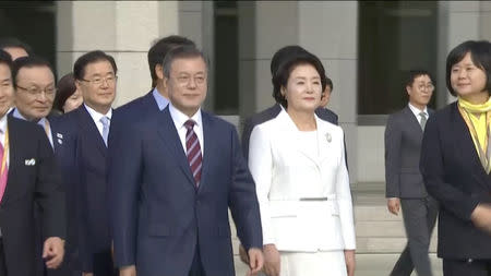 South Korean President Moon Jae-in and First Lady Kim Jung-sook before departing Seoul Airbase for Pyongyang to hold the third summit with North Korean leader Kim Jong Un in this still frame taken from video September 18, 2018. KBS/via REUTERS TV
