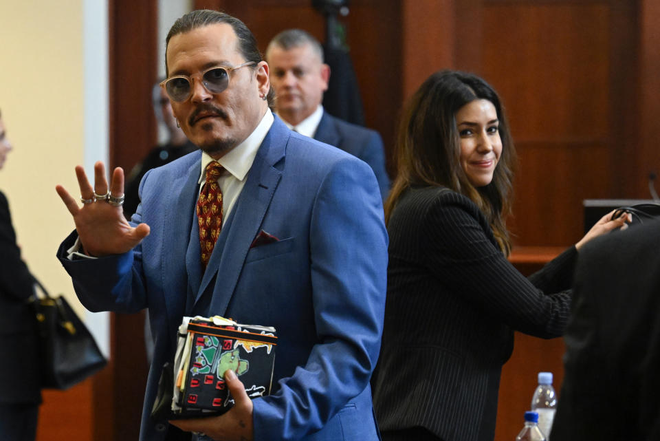 Johnny Depp and his lawyer Camille Vasquez in court during his defamation trial against Amber Heard. 