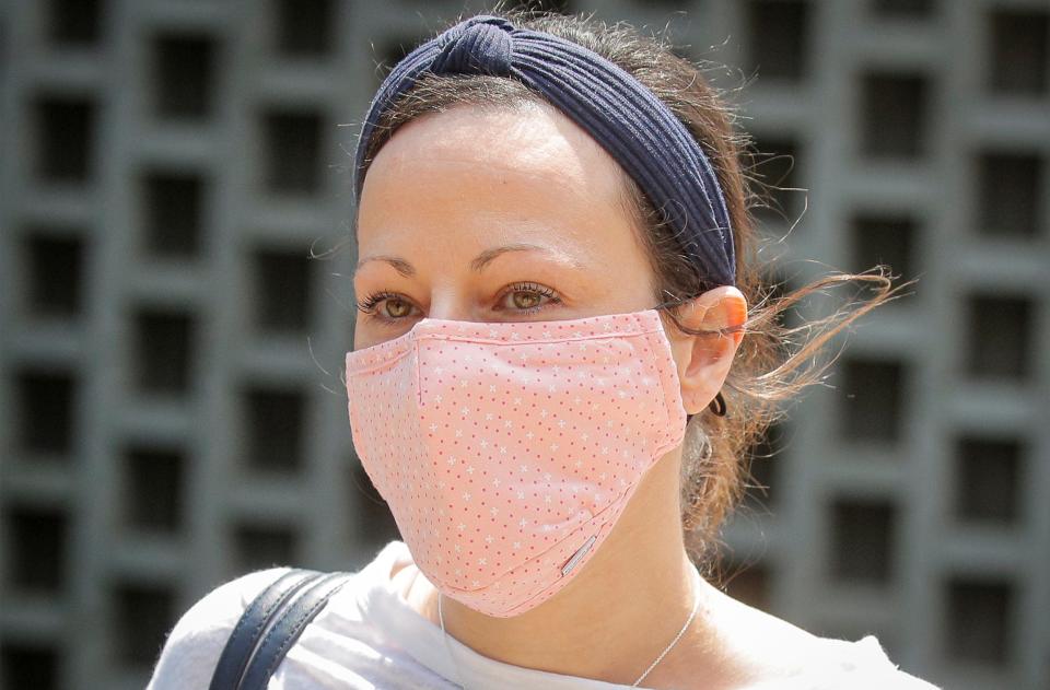 Lauren Salzman exits following her sentencing hearing at the Brooklyn Federal Courthouse in Brooklyn, New York, U.S., July 28, 2021.