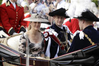 FILE - In this Monday, June 18, 2018 file photo, Britain's Prince Edward, center, in his roles as Knight Companion and his wife Sophie, Countess of Wessex, leave in a carriage after the Order of The Garter Service at Windsor Castle in Windsor, England. As the British royal family wrestles with the future roles of Prince Harry and his wife Meghan, it could look to Europe for examples of how princes and princesses have tried to carve out careers away from the pomp and ceremony of their families’ traditional duties. Prince Edward, the youngest son of Queen Elizabeth II, in 1993 launched a TV production firm that failed in 2011, and his wife Sophie tried to keep her established public relations firm going after she married Edward in 1999. (AP Photo/Matt Dunham, Pool, File)