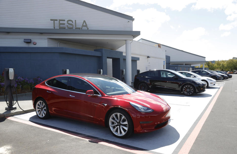 CORTE MADERA, CALIFORNIA - APRIL 26: Tesla cars charge at a Tesla Supercharger station on April 26, 2021 in Corte Madera, California. Tesla will report first quarter earnings today after the closing bell. (Photo by Justin Sullivan/Getty Images)