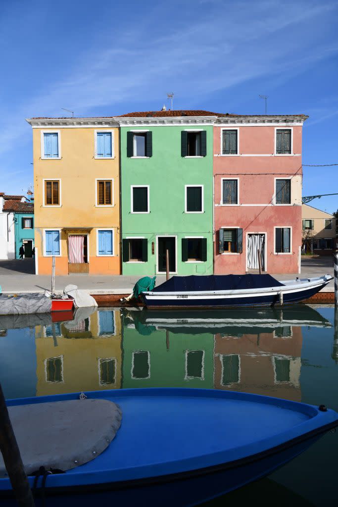 <p>A three-hued building offers some vibrance along the Venetian canals.</p>