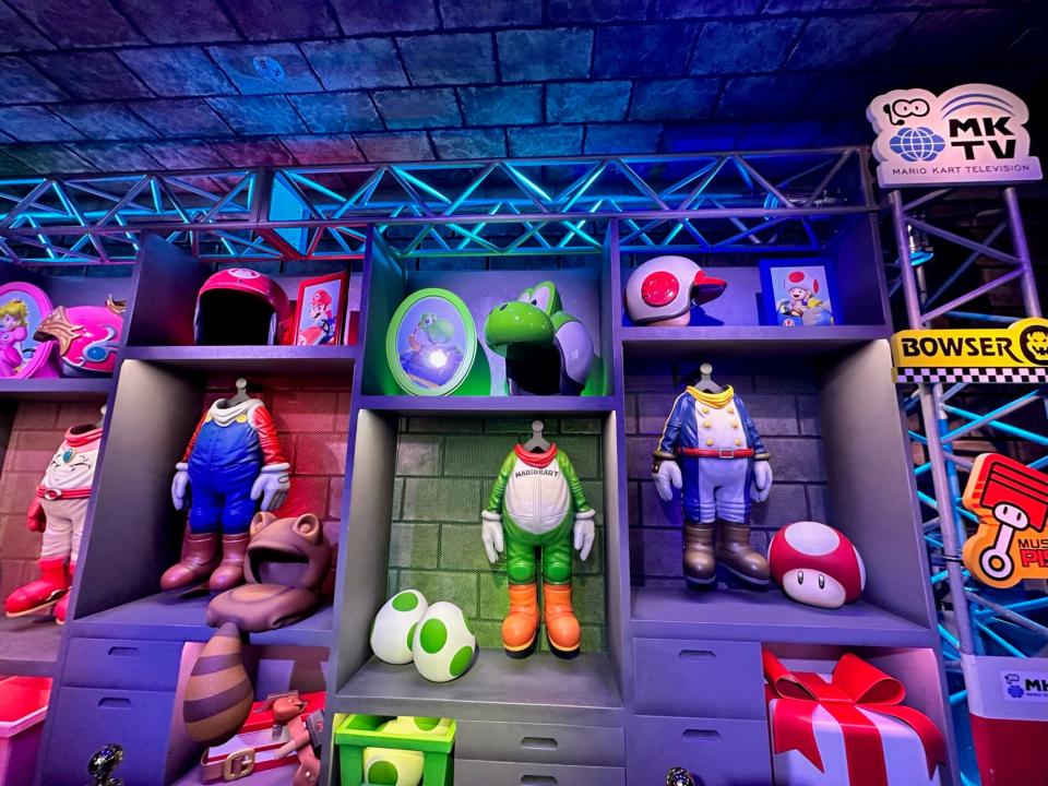 Mario Kart queue costumes in shelves