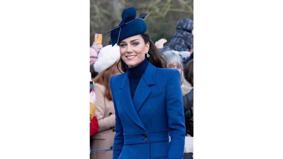 Kate Middleton wearing blue coat on Christmas Day