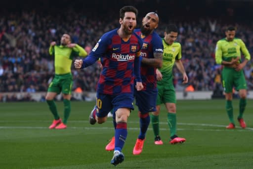 Lionel Messi scored four goals as Barcelona moved top of La Liga on Saturday with a 5-0 win over Eibar