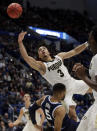 <p>Purdue’s Carsen Edwards (3) drives and is fouled by Villanova’s Phil Booth (5) during the first half of a second round men’s college basketball game in the NCAA Tournament, Saturday, March 23, 2019, in Hartford, Conn. (AP Photo/Elise Amendola) </p>