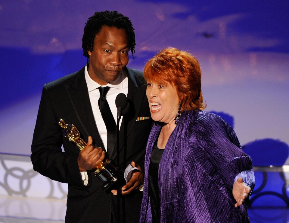 Director Roger Ross Williams and producer Elinor Burkett onstage during the 82nd Annual Academy Awards held at Kodak Theatre on March 7, 2010 in Hollywood, California.