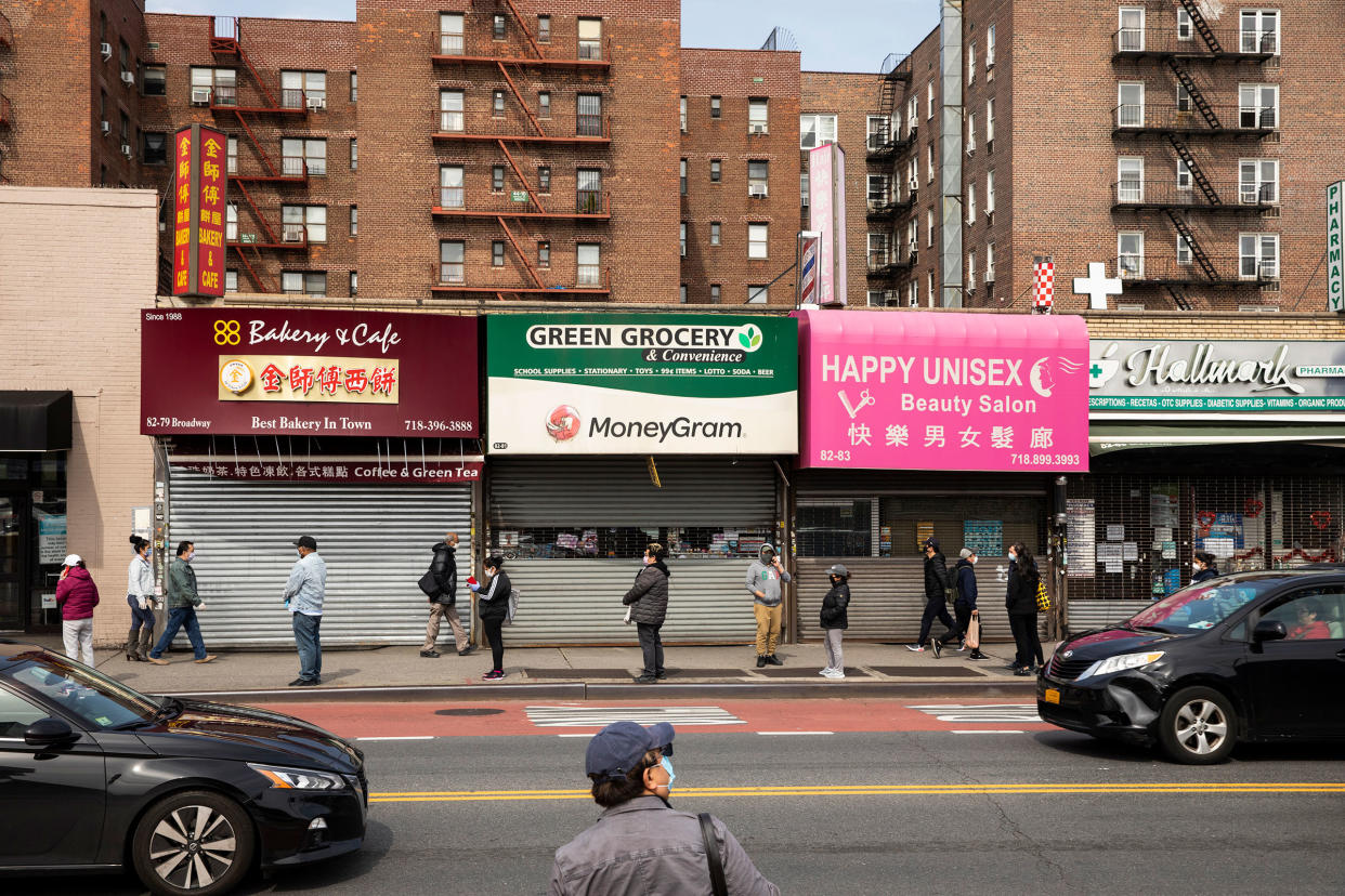 Shuttered businesses in Jackson Heights, Queens, April 19, 2020. (Benjamin Norman/The New York Times)