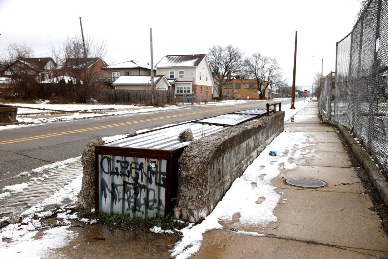The remains of a pedestrian walkway in Highland Park at Second Avenue and Pilgrim on Wednesday, Jan. 31, 2024.
