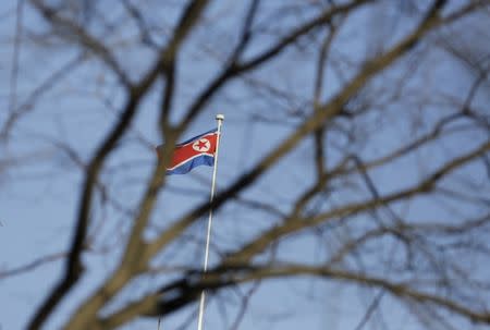 A North Korean flag is seen on the top of its embassy in Beijing, China, February 7, 2016. REUTERS/Jason Lee