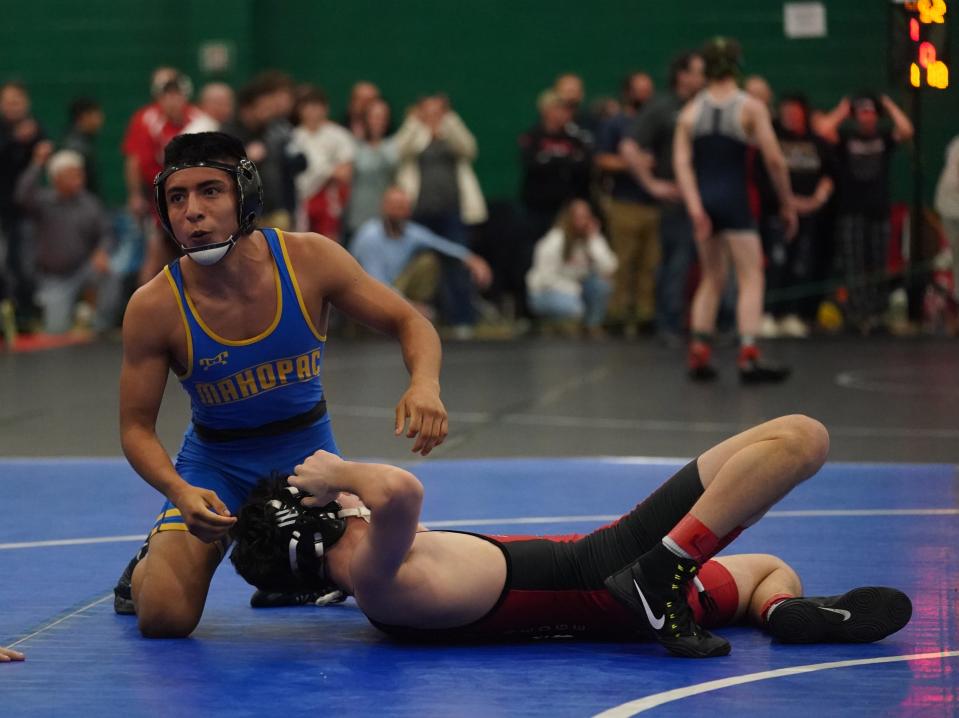 Mahopac's Joseph Ramirez wrestles in the 118-pound match in the round of 16 at the 2023 Eastern States Classic wrestling tournament at SUNY Sullivan County in Loch Sheldrake on Friday, January 13, 2023.