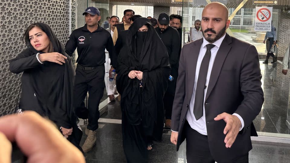 Bushra Bibi (center), wife of Imran Khan, leaves after a hearing of the bail case of Khan, at the High Court in Islamabad, Pakistan, in October 2023. - Sohail Shahzad/EFE/Zuma