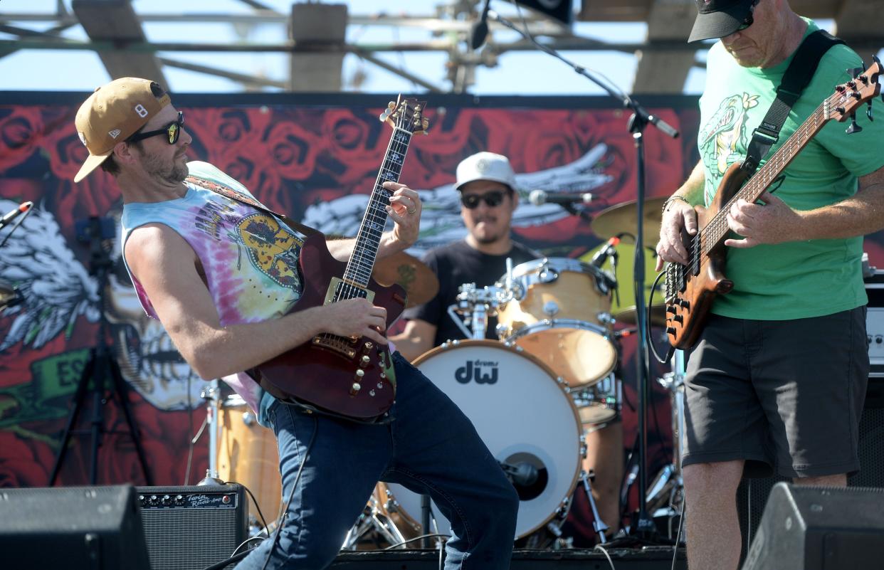 Guitarist Mark Masson, left, and bassist Jeff Hiller of the Ventura County band Shaky Feelin' are shown at the 2022 Skull & Roses Grateful Dead tribute festival at the Ventura County Fairgrounds. The group will return April 20 during the festival's five-day run starting April 19.