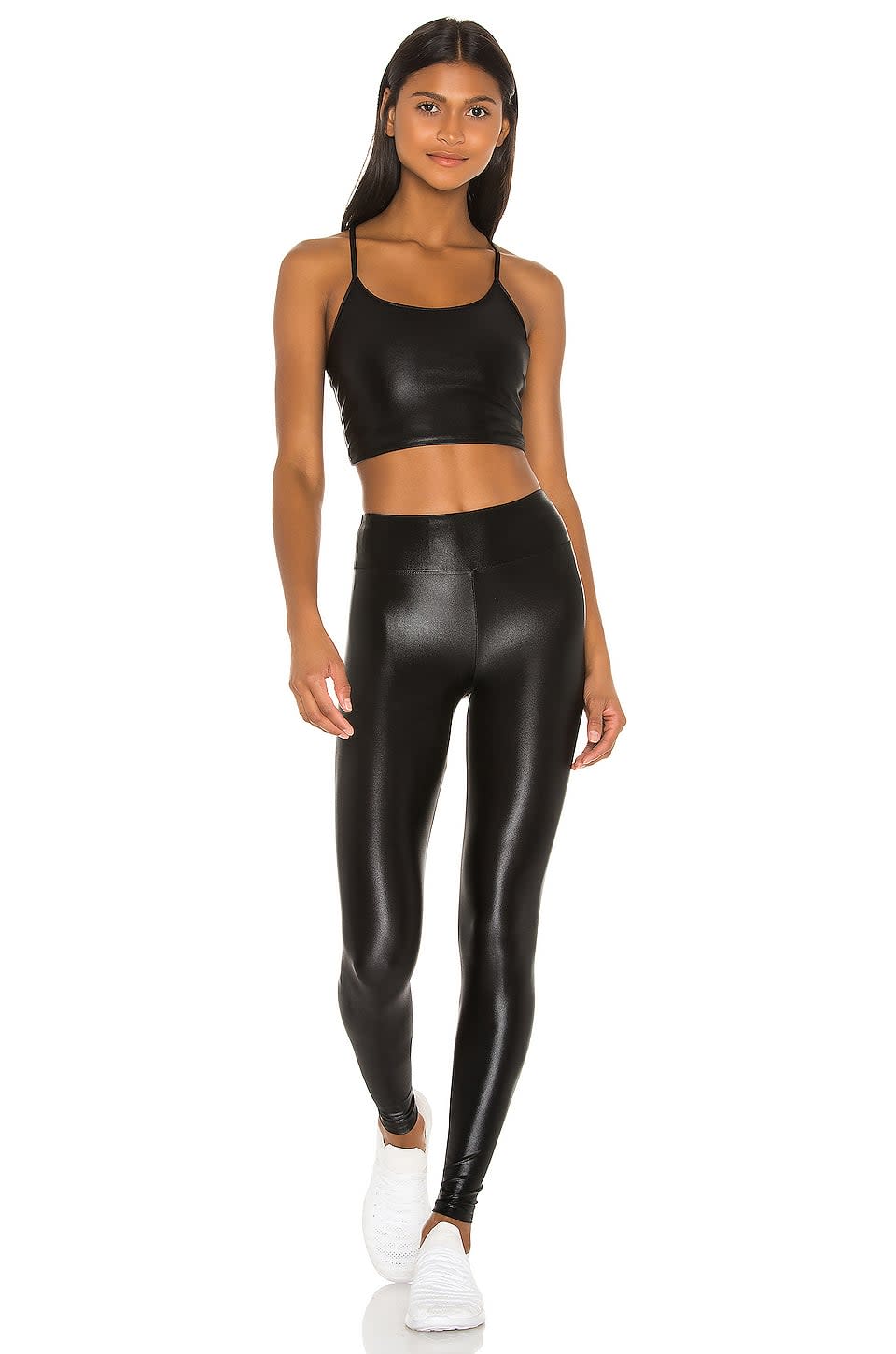 <p>This shiny <span>Koral Leah Infinity Sports Bra</span> ($65) and <span>Lustrous High Rise Legging</span> ($88) looks so good on. If you're working up a sweat, like in a hot yoga or boxing class, grab this set.</p>