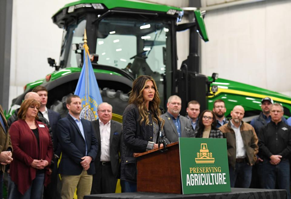Governor Kristi Noem signs HB 1090 into law on Wednesday, March 15, 2023, at C&B Operations in Mitchell.