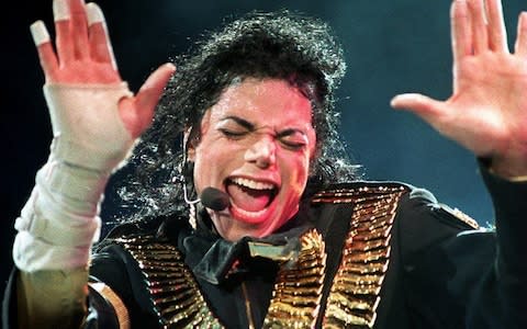 Michael Jackson performing during his "Dangerous" tour - Credit: AFP