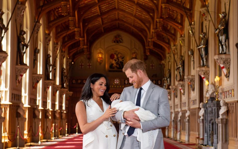 The Sussexes with their son Archie Harrison Mountbatten-Windsor shortly after his birth - AFP