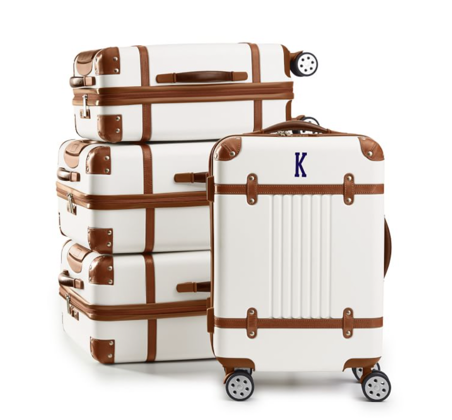 <p><a href="https://go.redirectingat.com?id=74968X1596630&url=https%3A%2F%2Fwww.markandgraham.com%2Fproducts%2Fterminal-1-family-luggage-set-white-brown%2F%3FcatalogId%3D50%26sku%3D5728920%26cm_ven%3DPLA%26cm_cat%3DGoogle%26cm_pla%3DTravel%2B%253E%2BLuggage%26region_id%3D666920%26cm_ite%3D5728920_19893848377%26gad_source%3D1%26gclid%3DCjwKCAiAsIGrBhAAEiwAEzMlC9ZOD4m8oJW9IvnnzczQBfDVKmHLe8AdSOVKpKcmW5K5kFECTj5OxBoCGPwQAvD_BwE&sref=https%3A%2F%2F" rel="nofollow noopener" target="_blank" data-ylk="slk:Shop Now;elm:context_link;itc:0;sec:content-canvas" class="link ">Shop Now</a></p><p>Terminal 1 Family Luggage</p><p>Mark & Graham</p><p>$760.00</p>