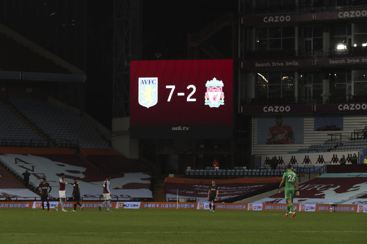 Liverpool players in dejection end of the English Premier League soccer match between Aston Villa and Liverpool at the Villa Park stadium in Birmingham, England, Sunday, Oct. 4, 2020. Aston Villa won 7-2. (Cath Ivill/Pool via AP)