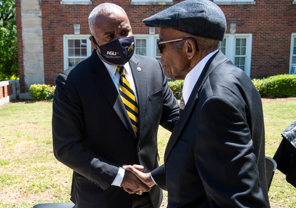 ASU President Quinton Ross and civil rights attorney Fred Gray shake hands during a ceremony renaming of Bibb Graves Hall to Jo Ann Robinson Hall after the late civil rights leader and educator at Alabama State University in Montgomery, Ala., on Tuesday, April 19, 2022. 