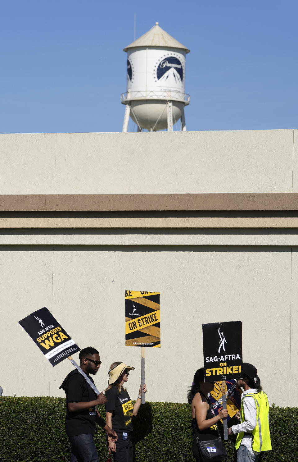 Striking actors picket outside Paramount Pictures studio, Friday, Nov. 3, 2023, in Los Angeles. (AP Photo/Chris Pizzello)