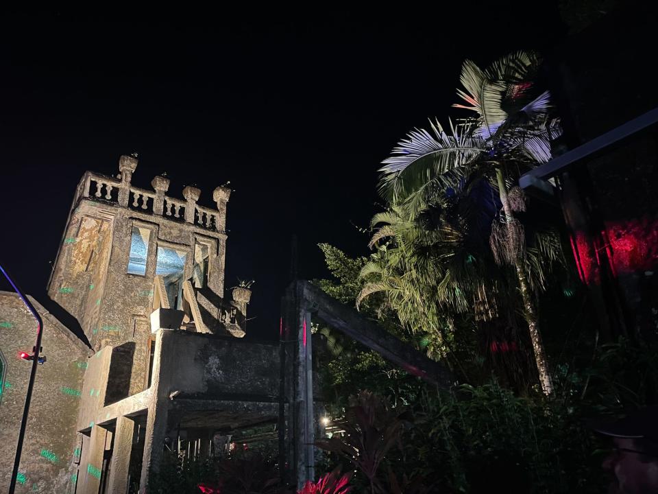 A view of one of the structures at Paronella Park at night.