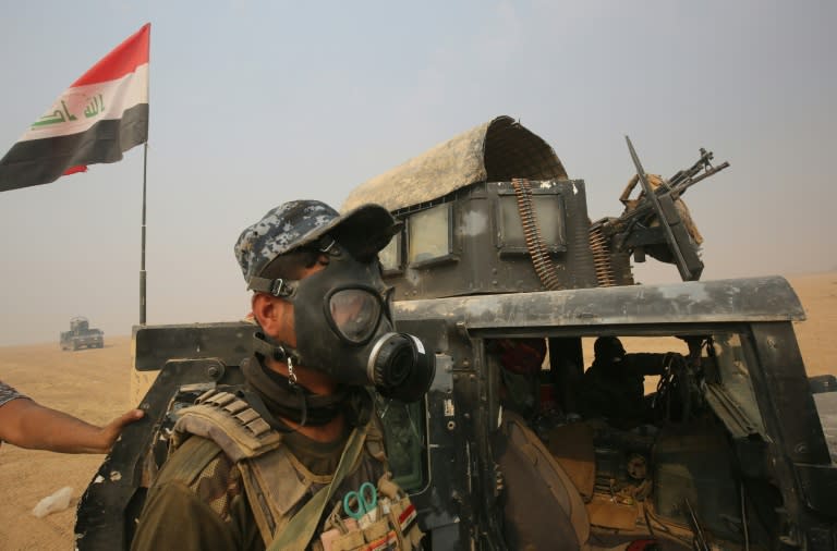 Iraqi forces gather in the al-Shura area, south of Mosul, on October 24, 2016, during an operation to retake the main hub city from the Islamic State