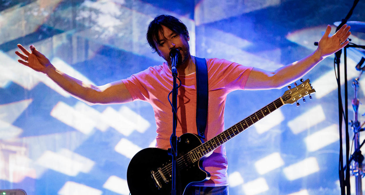  Bruce Soord of the Pineapple Thief onstage in Italy, playing a single-cut electric guitar. 