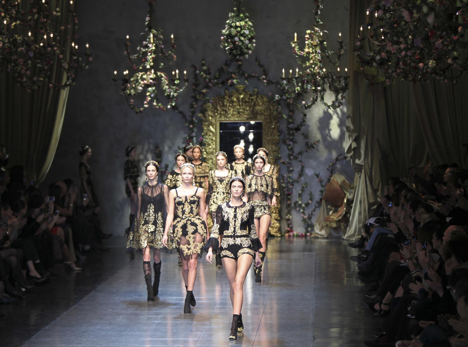 Models wear creations part of the Dolce & Gabbana women's Fall-Winter 2012-13 fashion collection, during the fashion week in Milan, Italy, Sunday, Feb. 26, 2012. (AP Photo/Antonio Calanni)