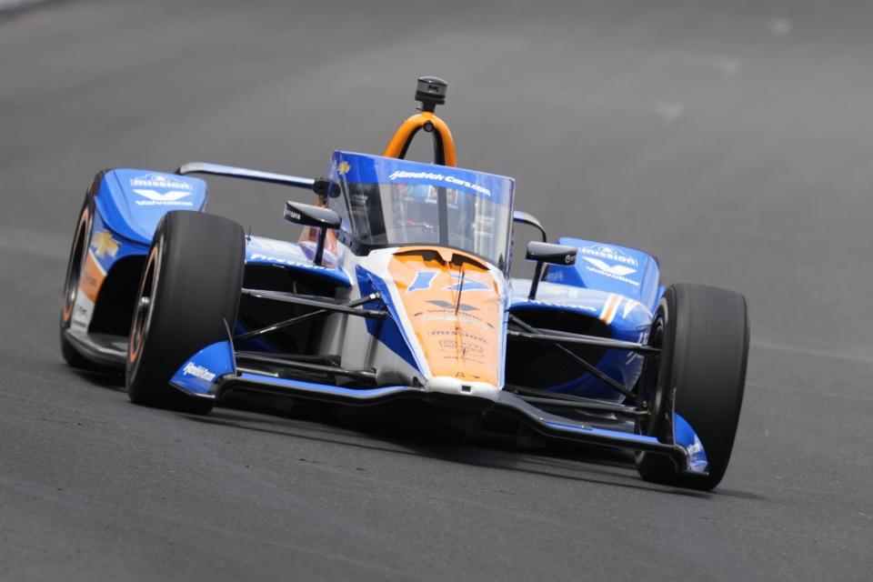 Kyle Larson drives into a corner during a practice session for the Indianapolis 500 auto race at Indianapolis Motor Speedway, Monday, May 20, 2024, in Indianapolis.  (AP Photo/Darron Cummings)