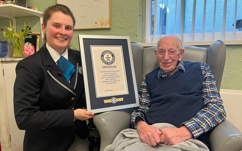 Mr Tinniswood was handed his Guinness World Record certificate at his care home in Southport