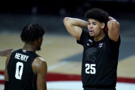 Michigan State forward Malik Hall (25) reacts after being called for a foul against Maryland during the second half of an NCAA college basketball game, Sunday, Feb. 28, 2021, in College Park, Md. Maryland won 73-55. Michigan State's Aaron Henry (0) looks on. (AP Photo/Julio Cortez)