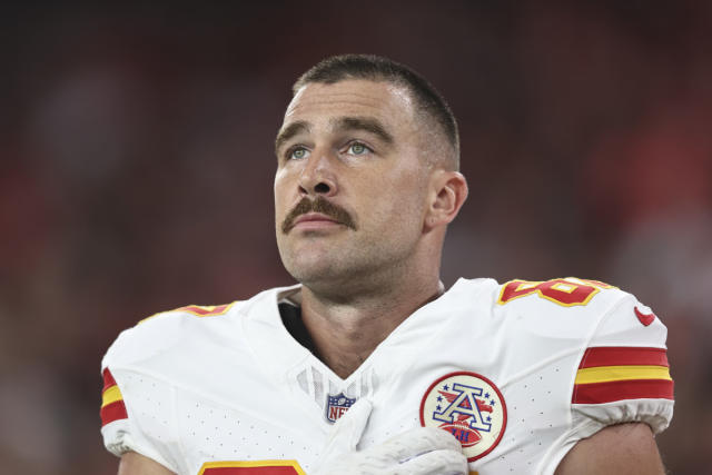 NFL Fans, Swifties Debate Video Of Travis Kelce Looking Up