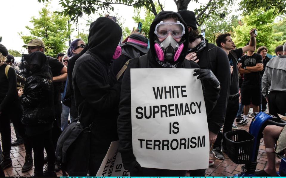 Counter protester at Portland, Oregon where 13 people were arrested following violent clashes - Getty Images North America