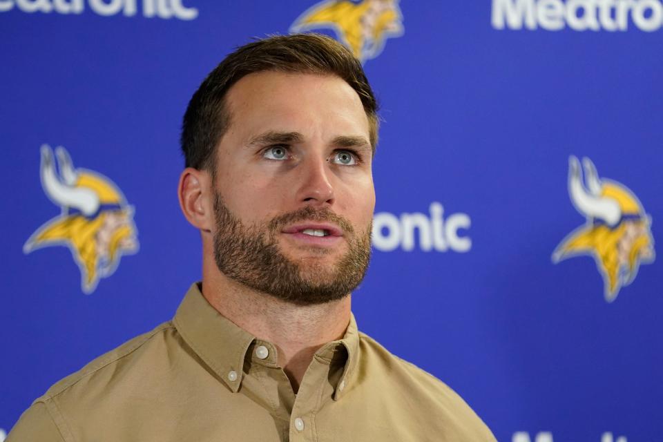 Minnesota Vikings quarterback Kirk Cousins listens to a reporter's question after the team's 19-13 win over the Chicago Bears in an NFL football game Sunday, Oct. 15, 2023, in Chicago. (AP Photo/Charles Rex Arbogast)