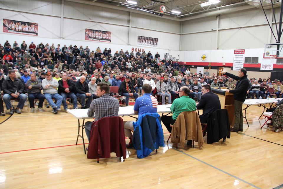 U.S. Rep. Mike Gallagher calls for a question Monday evening at a lake sturgeon management meeting at Stockbridge High School in Stockbridge.