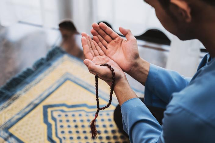 A Muslim man praying.