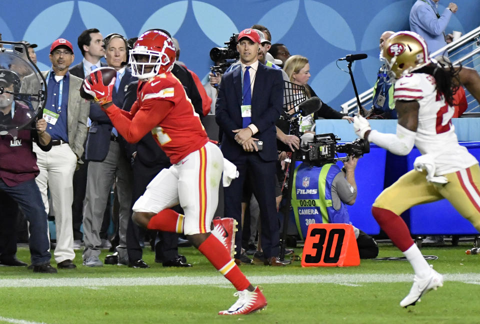 MIAMI, FLORIDA - FEBRUARY 02: Sammy Watkins #14 of the Kansas City Chiefs runs with the ball after catching a pass against the San Francisco 49ers in Super Bowl LIV at Hard Rock Stadium on February 02, 2020 in Miami, Florida. The Chiefs won the game 31-20. (Photo by Focus on Sport/Getty Images)