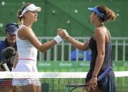 2016 Rio Olympics - Tennis - Preliminary - Women's Singles Second Round - Olympic Tennis Centre - Rio de Janeiro, Brazil - 08/08/2016. Madison Keys (USA) of USA shakes hands with Kristina Mladenovic (FRA) of France after winning their match. REUTERS/Kevin Lamarque