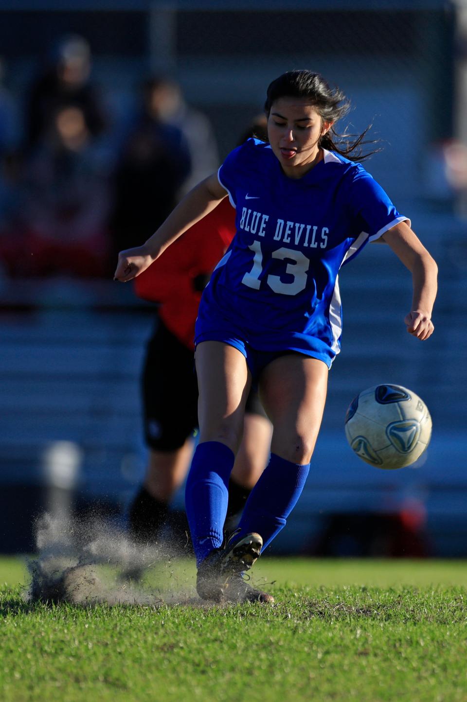 Stanton's Emma Griner (13) kicks the ball during the first half of a Class 4A playoff against Santa Fe.