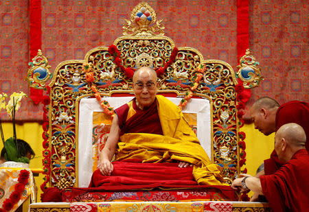 Tibet's exiled spiritual leader the Dalai Lama awaits a public religious lecture to the faithful in Zurich, Switzerland October 14, 2016. REUTERS/Arnd Wiegmann