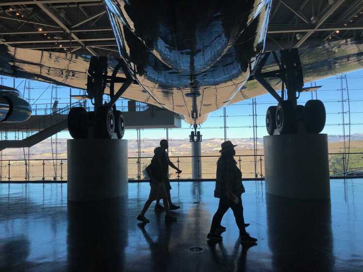 The Negron family of Santa Clarita walks beneath the decommissioned Air Force One jet that transported President Ronald Reagan and other commanders in chief. The aircraft is on display at the Reagan Presidential Library in Simi Valley.