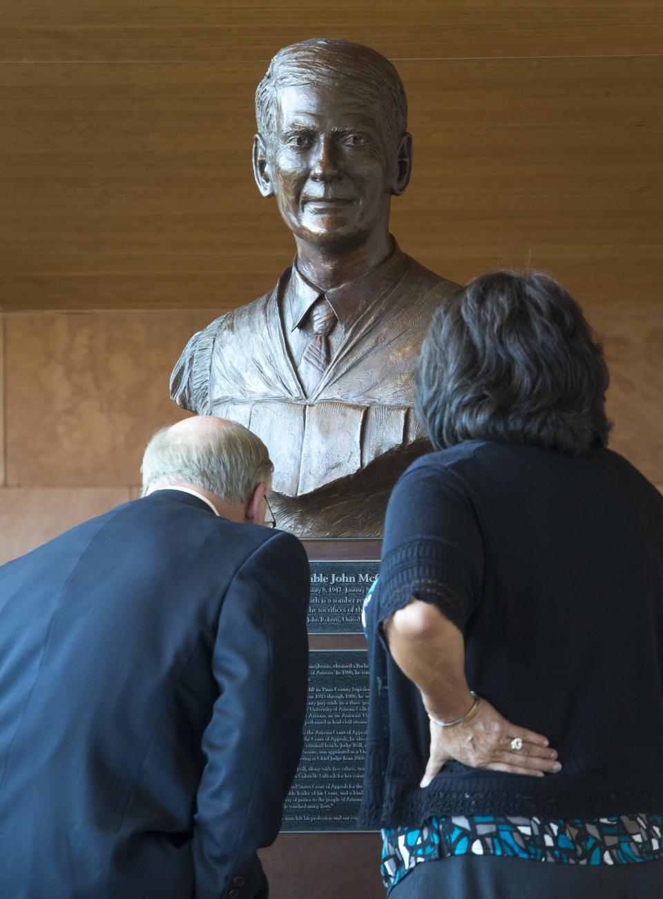 A bust of the late Judge John Roll is in the lobby of the John M. Roll U.S. Courthouse in Yuma. Roll was among six people who died in front of the Tucson grocery store after stopping by to greet Rep. Gabby Giffords on Jan. 8, 2011.