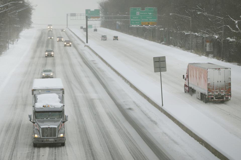 Washington metro area Capital Beltway, normally observed with bumper to bumper morning commuter traffic, is seen during a snow storm in Silver Spring