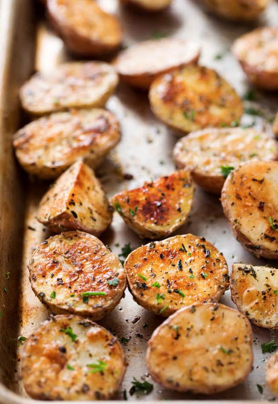 <p>The Chunky Chef</p><p>The most amazing crispy roasted potatoes that are rubbed with a fantastic homemade Greek seasoning blend!</p><p><strong>Get the recipe: <a href="https://www.thechunkychef.com/crispy-greek-oven-roasted-potatoes/" rel="nofollow noopener" target="_blank" data-ylk="slk:Crispy Greek Oven Roasted Red Potatoes;elm:context_link;itc:0;sec:content-canvas" class="link ">Crispy Greek Oven Roasted Red Potatoes</a></strong></p>