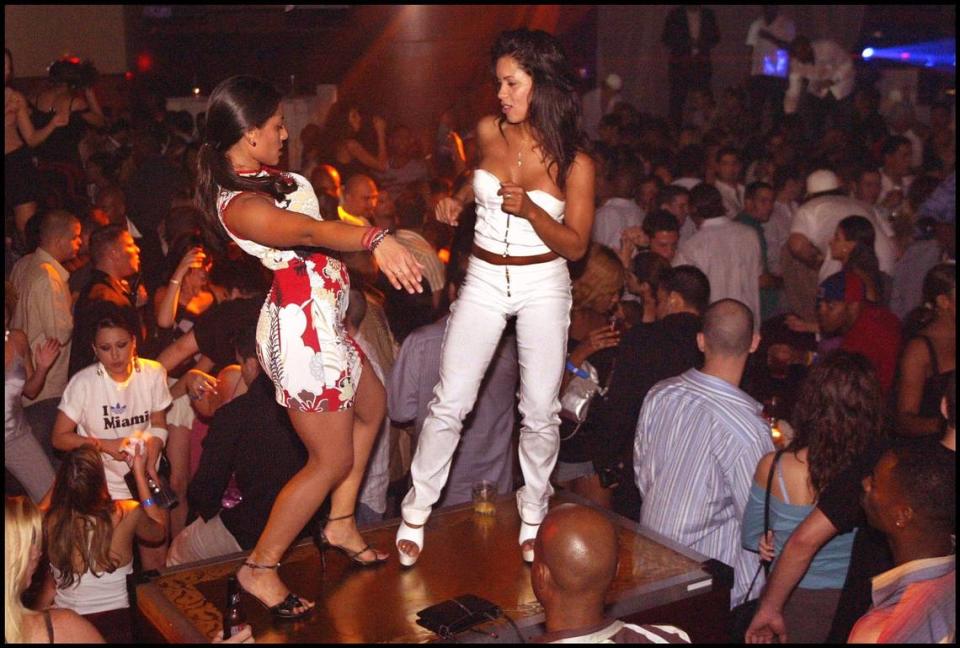 In 2004, clubgoers dance to the beat of DJ Mr Mauricio’s music at Mansion nightclub on South Beach.