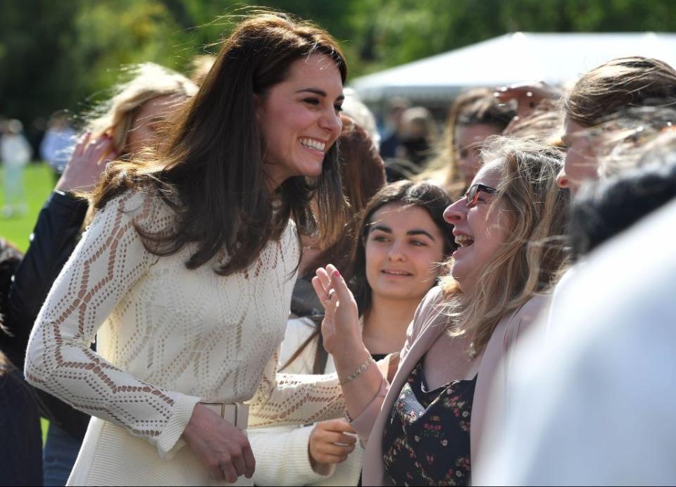 Kate Middleton meets tea party guests at Buckingham Palace