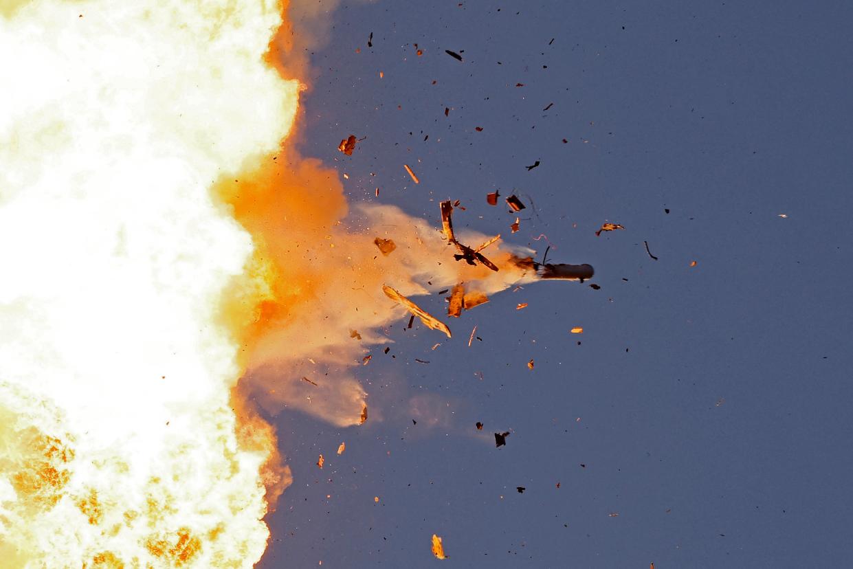 This photo taken from a position in northern Israel shows a Hezbollah UAV intercepted by Israeli air forces over north Israel on 25 August 2024 (AFP via Getty Images)